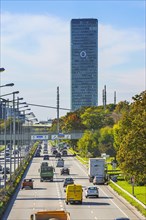 Road traffic at Georg-Brauchle-Ring with O2 tower