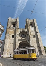 Tram passes by Catedral Se Patriarcal