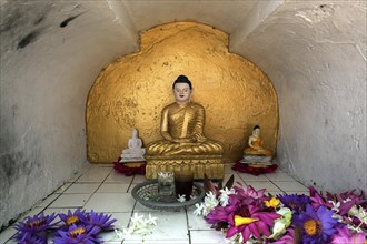 Small golden Buddha statue