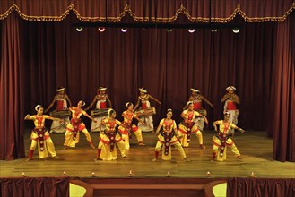 Drummers and dancers at a performance of Kandy dancers