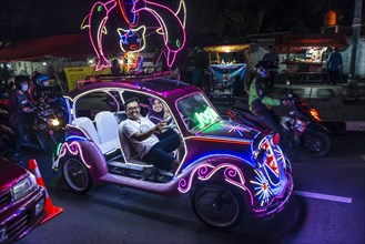 Car illuminated with colourful LEDs