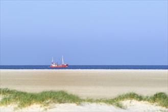 Red fishing boat in the North Sea