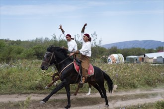Two riders on horseback