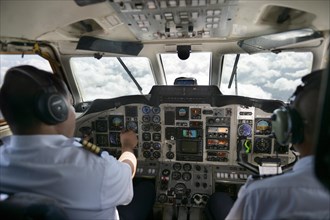 Pilot and copilot control the twin-engine propeller aircraft British Aerospace Jetstream 3200