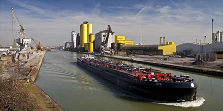 Cargo ship on the Datteln-Hamm Canal in city port