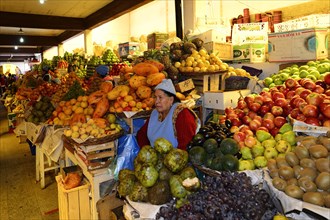 Sale of fruit at market stall