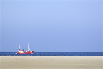 Red fishing boat in the North Sea