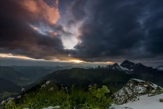 View from Zafernhorn at sunrise with dark clouds