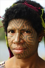 Korafe woman with face tattoo