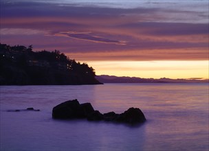 Pink sunset scenery on the ocean coast