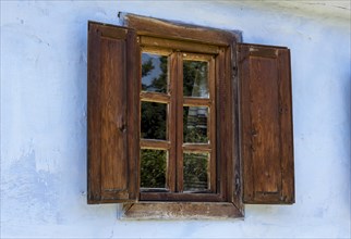 Wooden window in the Astra Museum of Traditional Folk Civilization