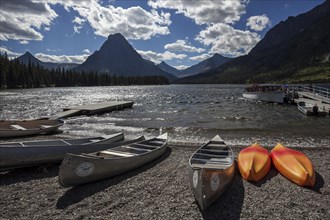 Canoes on the shore of Two Medicine Lake