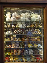 Display in shop window with pastry
