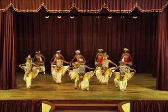 Drummers and dancers at a performance of Kandy dancers