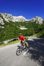 Cyclists on the pass road between Vrsic