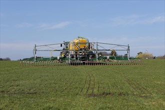 Liquid manure is spread on a field