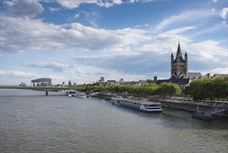 Rhine promenade with church Gross St. Martin