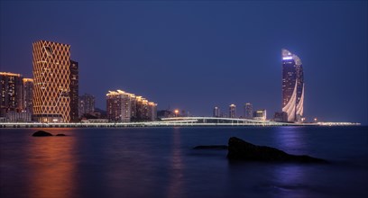 View of the skyline of Xiamen as seen from Gulangyu Island at dusk