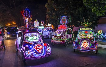 Cars illuminated with colourful LEDs