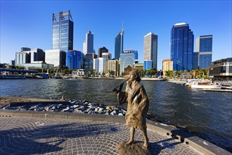 Sculpture of a woman with City skyline