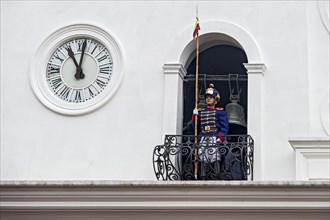 Soldier of the Presidential Guard keeps watch on balcony