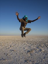 African man jumping