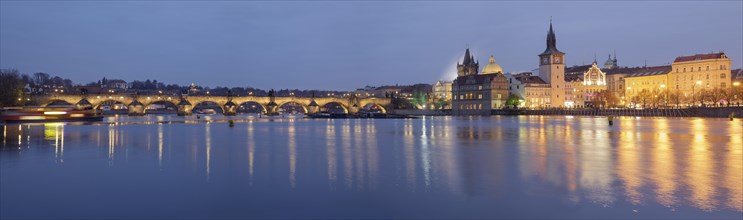 Charles Bridge and the Old Town over the River Vltava at dusk