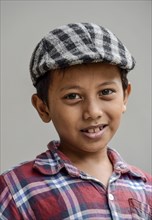 Boy with shirt and flat cap