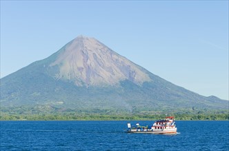 Ferry in front of the island of Ometepe with the volcano Concepcion