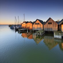 Boat houses in the harbour at Saaler Bodden