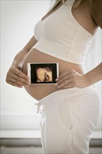 Woman in her ninth month pregnant