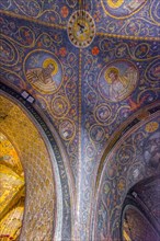 Decorated vaulted ceiling with frescoes