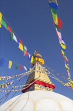 Buddhist stupa with prayer flags