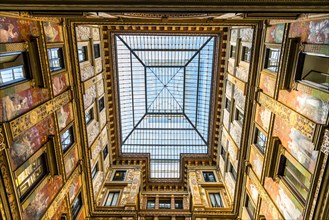 Ornately painted and decorated courtyard of the Palazzo Sciarra Galleria Sciarra