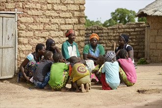 Women sitting in a circle having a conversation
