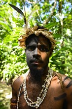 Tribal warrior in the Ekasup Cultural Village