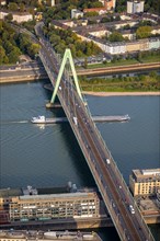 Severinsbrucke with Rhine and cargo ship