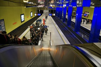 People on escalator