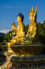 Big golden statues of Padmasambhava