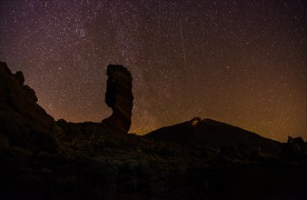Roque Cinchado and Teide vulcano with starry sky