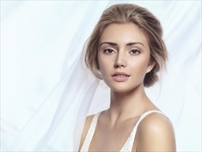 Young beautiful woman face beauty portrait with clean natural look