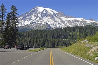 Snow-capped summit of Mount Rainier and road