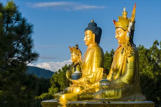 Big golden statues of Padmasambhava