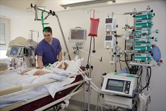 Nurse during his work in intensive care in hospital