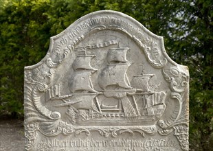 Old grave stone with Sailboat on cemetery