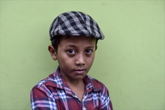 Boy with shirt and flat cap