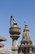 Statue of king Yoganarendra Malla with snake and bird