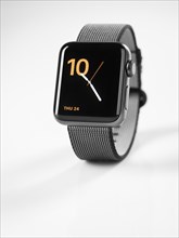Apple Watch series 2 smartwatch with analog clock dial displayed