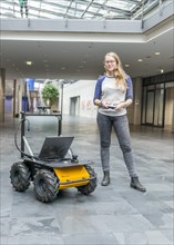 Student controls a robot car