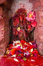 Small statue of god Kaalratri outside Khadga Devi Temple